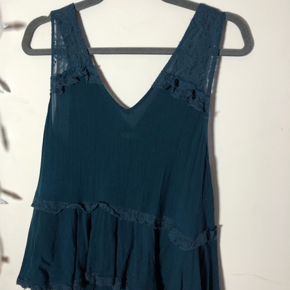 Free people teal blouse. Ruched satiny material
